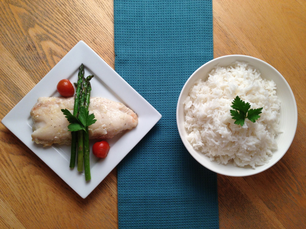 Pan fried hake with coconut rice and asparagus